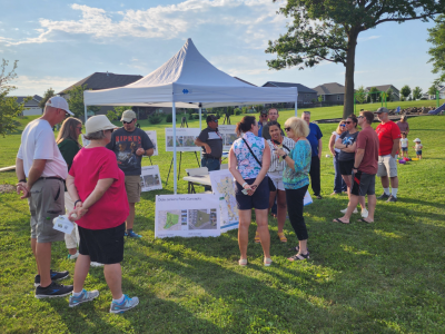 People talking at the Park and Connect Event